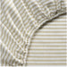 Close-up of beige and white striped fabric with a textured pattern