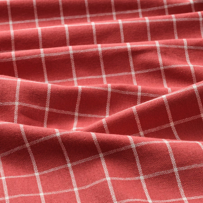 Red fabric with white checkered pattern