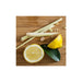 Lemons and lemongrass on a wooden cutting board