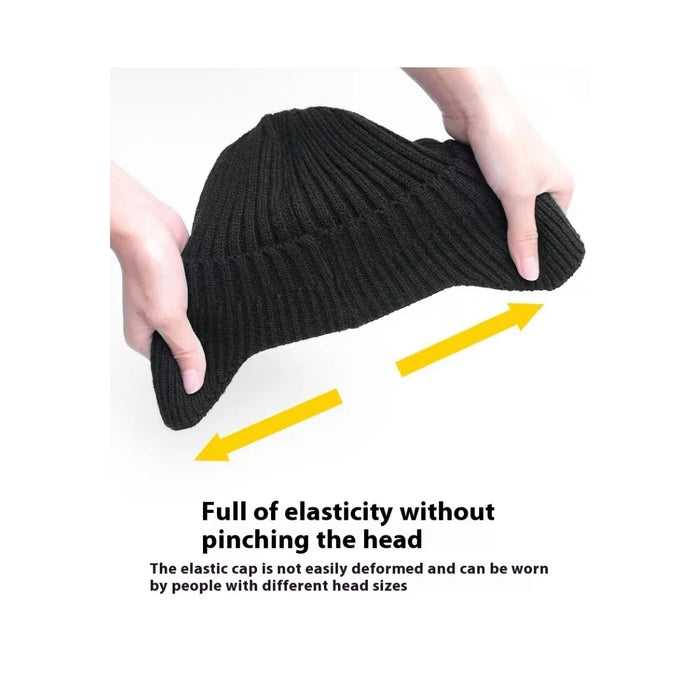 Digital Shoppy woolen cap – black knitted cap stretched horizontally, showing elasticity and comfort for all head sizes