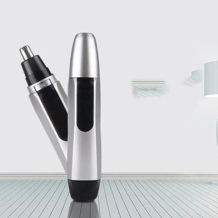 Silver and black electric nose hair trimmer on a white background