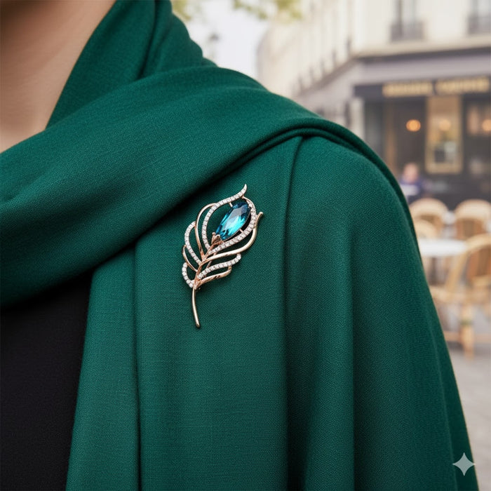 pinned to green shawl in outdoor café setting for chic look