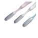 Three nail files with textured handles on a white background