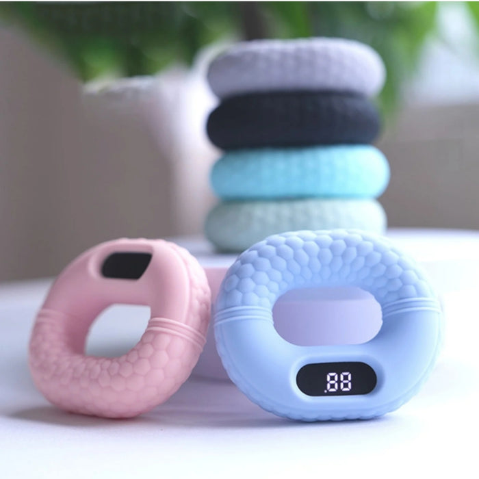 Colorful digital kitchen scales on a white surface with a blurred background