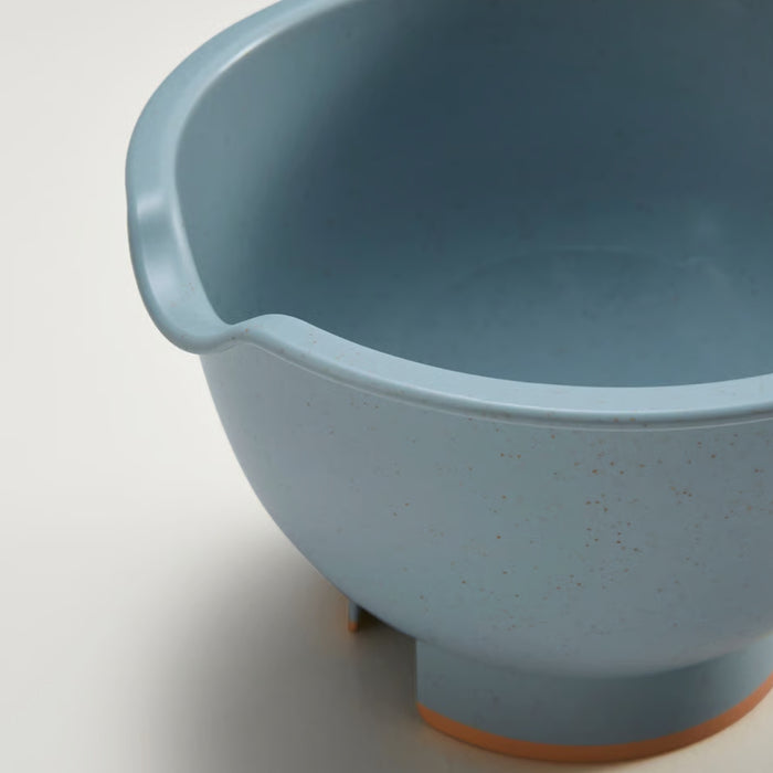 A blue speckled mixing bowl with an orange base and a pouring spout, designed for effortless whisking and mixing. Stylish and practical for kitchen use.- 90607438