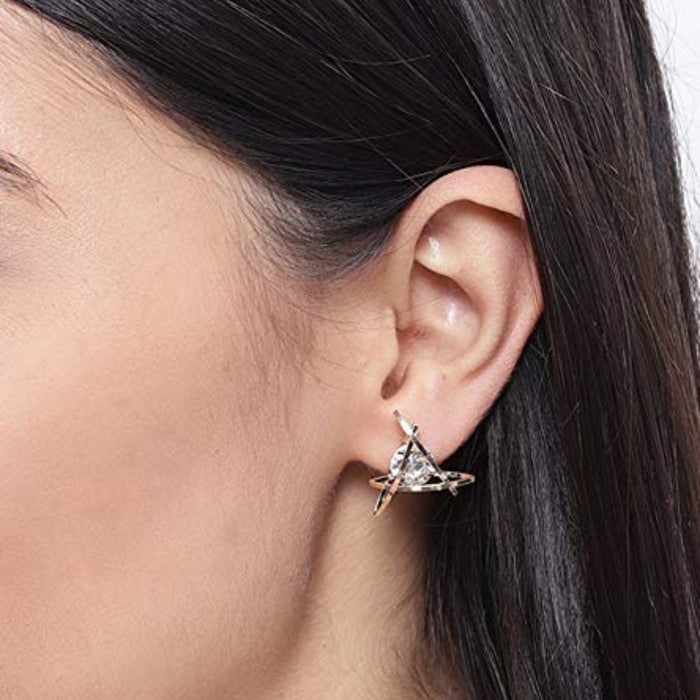 Triangle gold earrings – close-up of triangular crystal earrings with planetary-style gold ring, worn on ear

