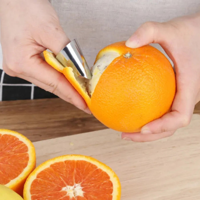 Stainless steel sheller tool used to peel orange – ergonomic design for clean citrus preparation – 771727