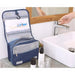Travel storage waterproof bag, blue. Shown open on sink counter with towel, toothbrush, and essentials in mesh pockets – organized bathroom setup with clean, practical styling – 13403615.