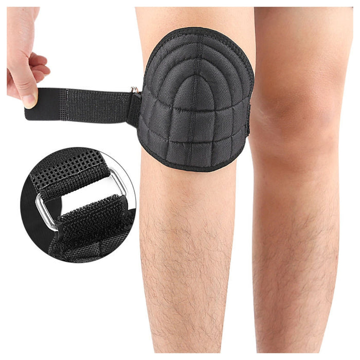 Black knee pad being worn on a person's knee with close-up inset showing the strap mechanism.