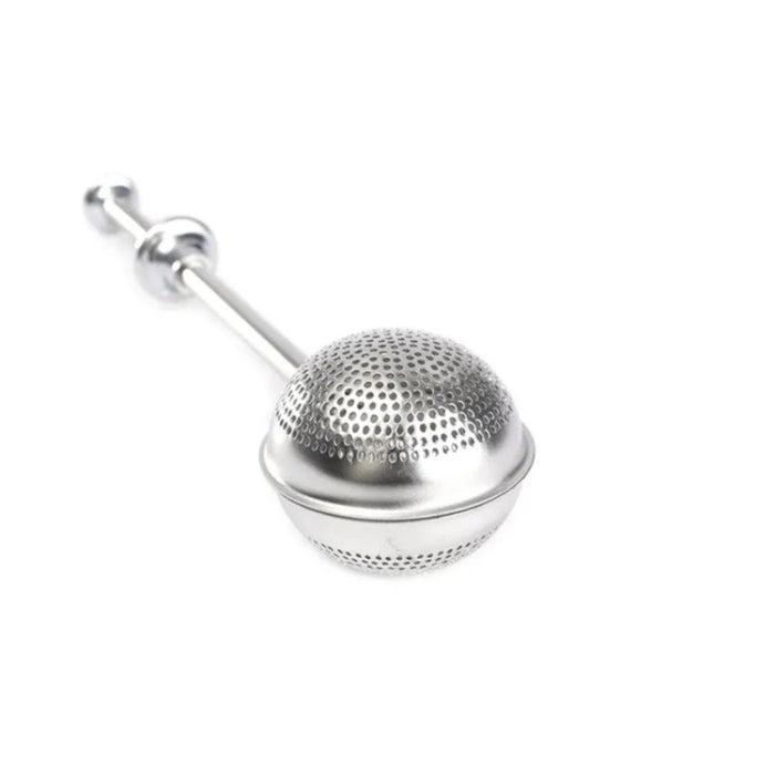 Metallic tea ball on a white background