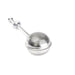 Metallic tea ball on a white background
