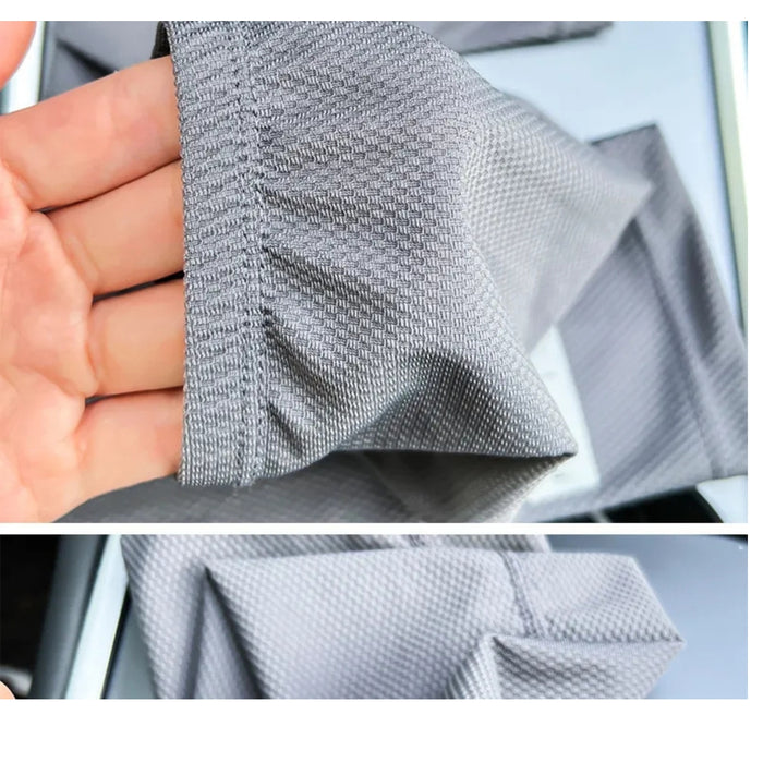 Detailed view of sleeve fabric and stitching, emphasizing soft grid weave and durable construction