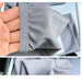Detailed view of sleeve fabric and stitching, emphasizing soft grid weave and durable construction