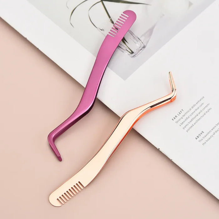Pink and rose gold tweezers on a light pink surface with a book in the background