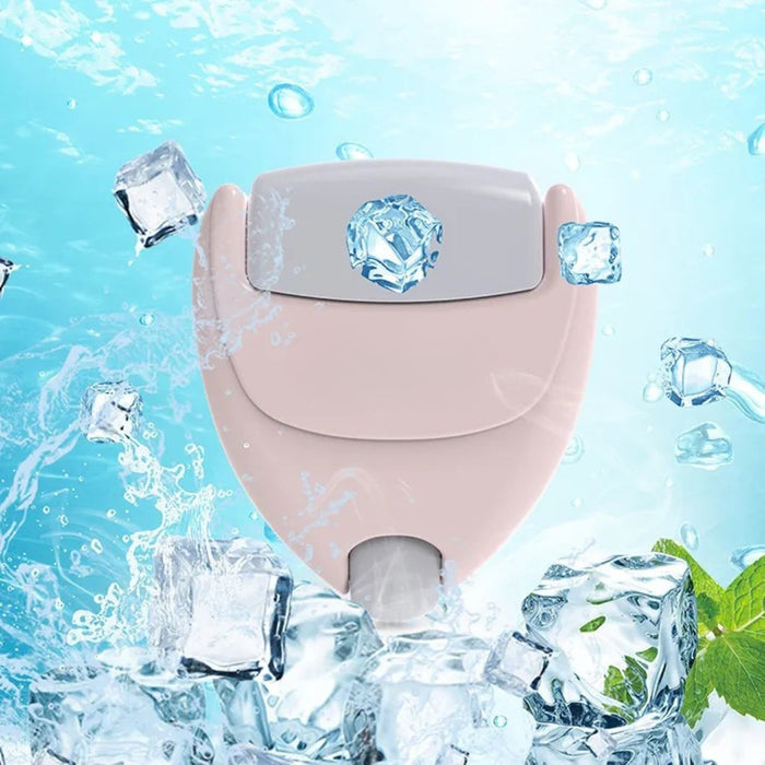 Heart-shaped ice roller – pink handle roller surrounded by ice cubes, water splash, and mint leaves for freshness