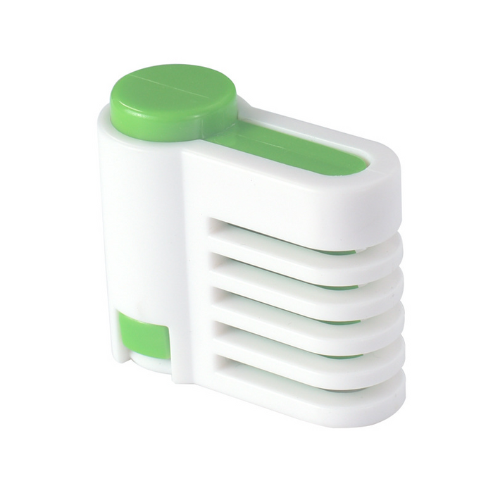Top view of bread being split with ergonomic cake separator tool