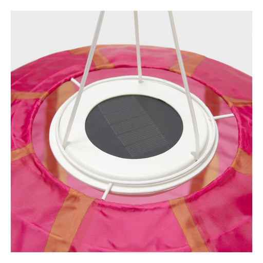 Solar panel on a pink and orange hanging lantern