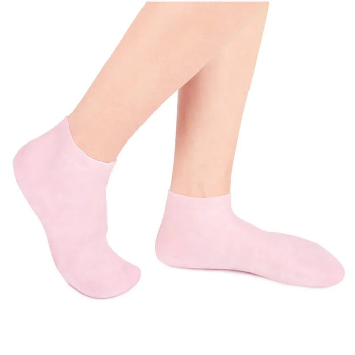 Pink socks worn on a white background