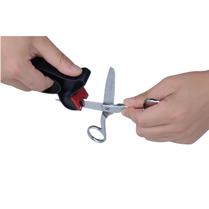 2-in-1 Knife & Scissor Sharpener – Handheld, ergonomic grip, black tool sharpening scissors in action - 