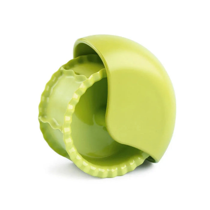 Green plastic container with a lid on a white background