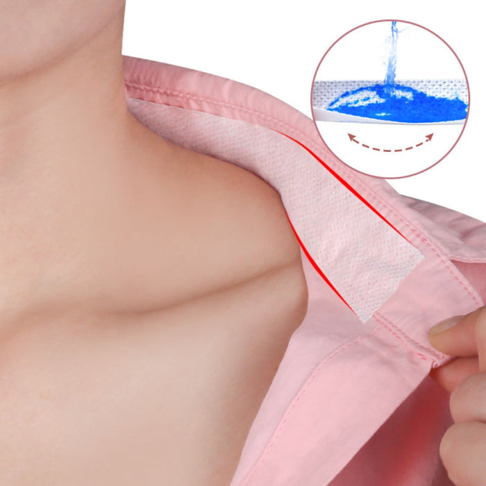 Demonstration of the high absorption capacity of the shirt neck liner, showing how it quickly wicks away blue-tinted liquid to keep the fabric dry