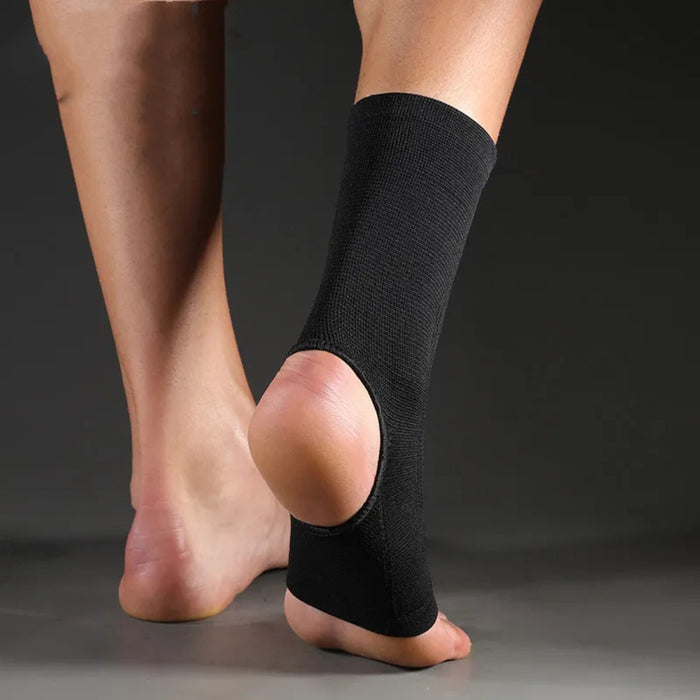 Black ankle sleeve – close-up of brace on foot with breathable fabric and flexible compression