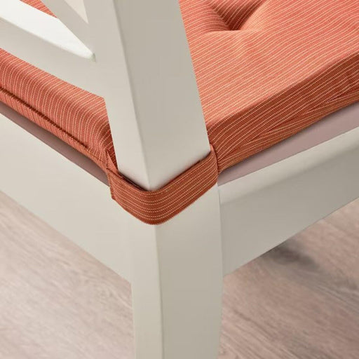 Ties securing the JUSTINA Chair Pad to the chair for stability-90566065
