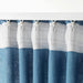 IKEA VIDGA white glider and hook close-up showing stainless steel hook and polyethylene wheel detail