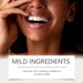 Close-up of a person with a smile, with text about mild ingredients suitable for sensitive teeth.