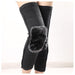 Black leg warmers with gray fleece patch on a white background