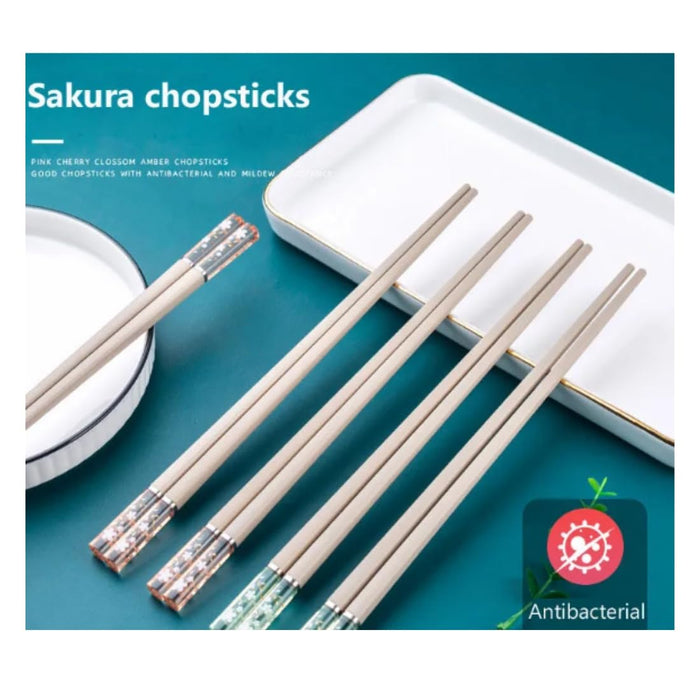 Sakura chopsticks with antibacterial feature on a blue background