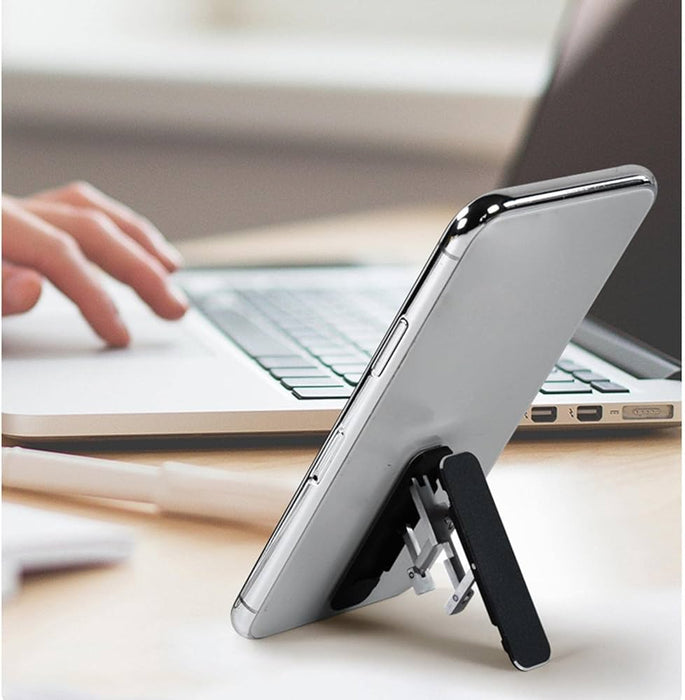 A compact, foldable tablet stand made of aluminum alloy with an adjustable multi-angle design and anti-slip base. Ideal for gaming, video streaming, reading, and working on tablets or smartphones."