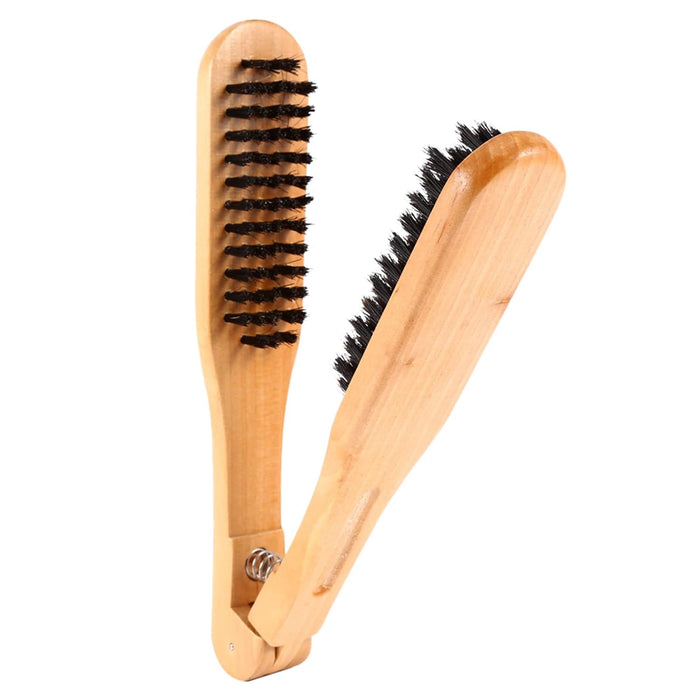 Wooden shoe brush with black bristles on a white background