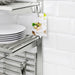  KUNGSFORS rail installed on tiled kitchen wall with stainless steel shelves, holding clipped recipe card and stacked plates