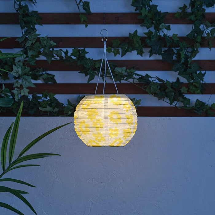 IKEA SOLVINDEN Pendant lamp, flower/solar-powered orange, 22 cm With LED solar-powered pendant lamp, outdoor globe/yellow flower, 22 cm