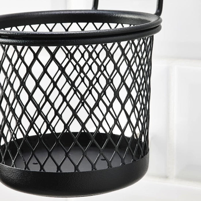 Black mesh basket on a white background
