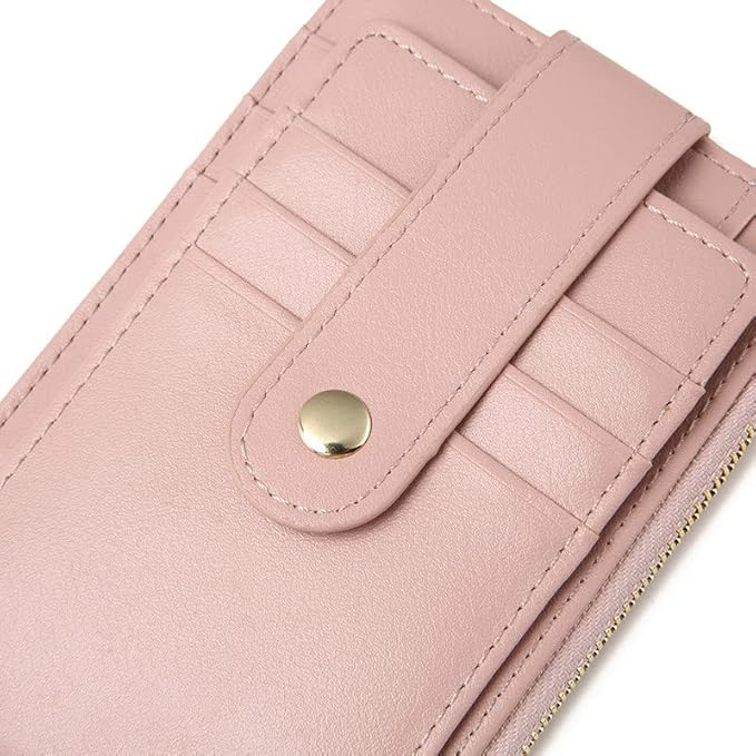 Close-up of a pink wallet with a gold button on a white background