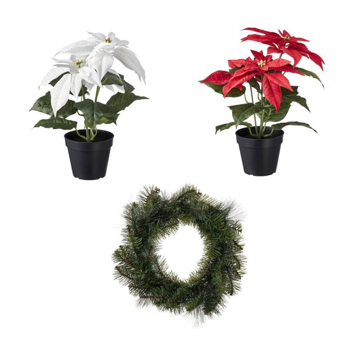 IKEA Christmas poinsettia plants and pine wreath displayed on holiday table