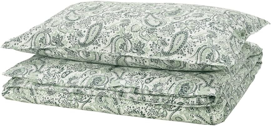 RODGERSIA green and white duvet cover with matching pillowcase on a neatly made bed