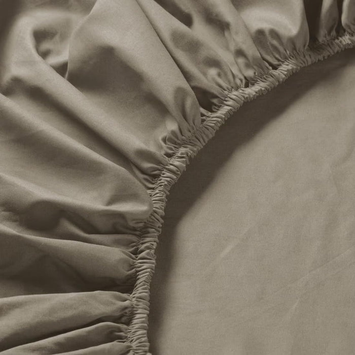 Close-up of IKEA ULLVIDE grey-beige fitted sheet elastic hem detail secure mattress fit