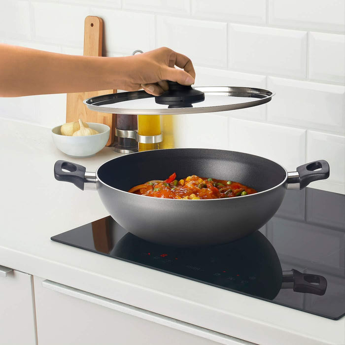 IKEA ALTICKA Kadai wok with lid, 28 cm (11 ")   with  LÄMPLIG Trivet, stainless steel, 50x28 cm.