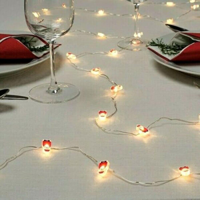 IKEA STRÅLA LED lighting chain with 30 lights, battery-operated/Santa Claus With LED Candle Holder, Battery-Operated,