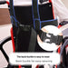 Digital Shoppy wheelchair back buckle strap shown attached to red wheelchair frame