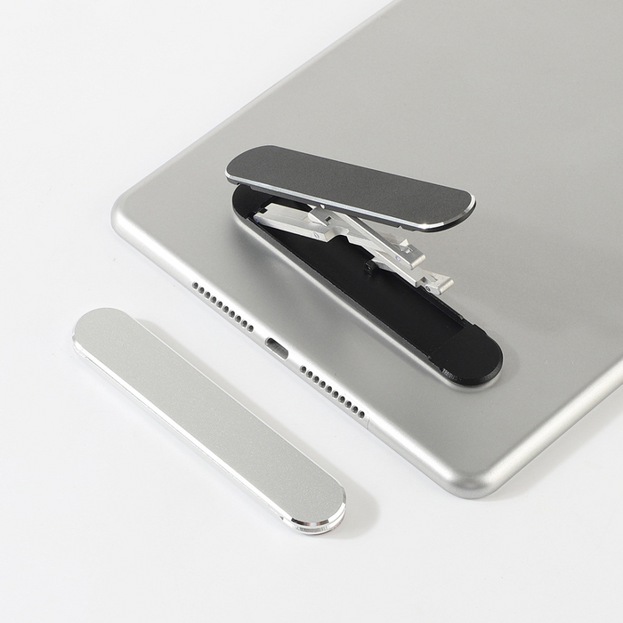 "A compact and foldable aluminum tablet stand with an adjustable multi-angle design, anti-slip base, and sturdy kickstand. Ideal for gaming, video streaming, reading, and working on tablets or smartphones.