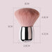 Makeup brush with pink bristles and metallic handle shown with labeled dimensions
