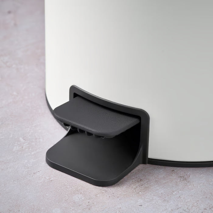 Close-up of the sturdy black foot pedal for hands-free and hygienic operation.