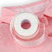 Top-down view of the 2.5cm wide, 8m long roll of self-adhesive collar tape placed over a pink button-down shirt.