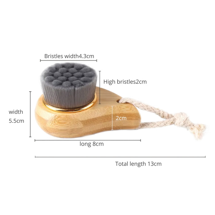 Facial cleansing brush with measurements on a white background