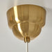 Gold ceiling light fixture on a white background