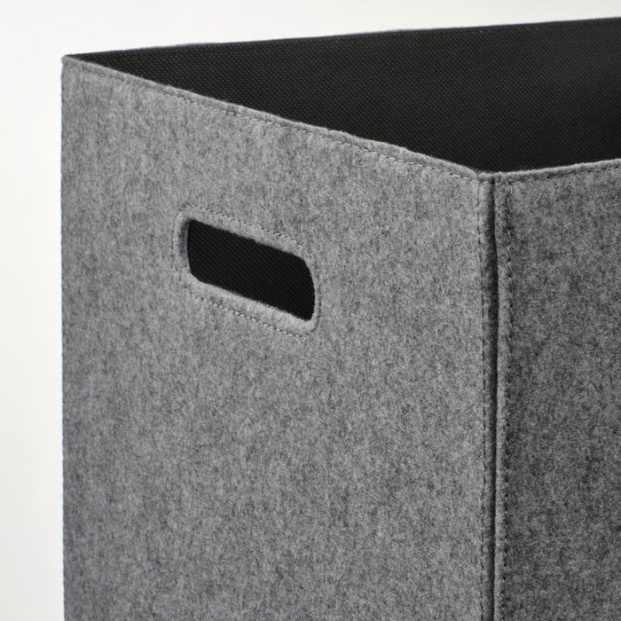 Gray fabric storage bin with a black interior on a white background